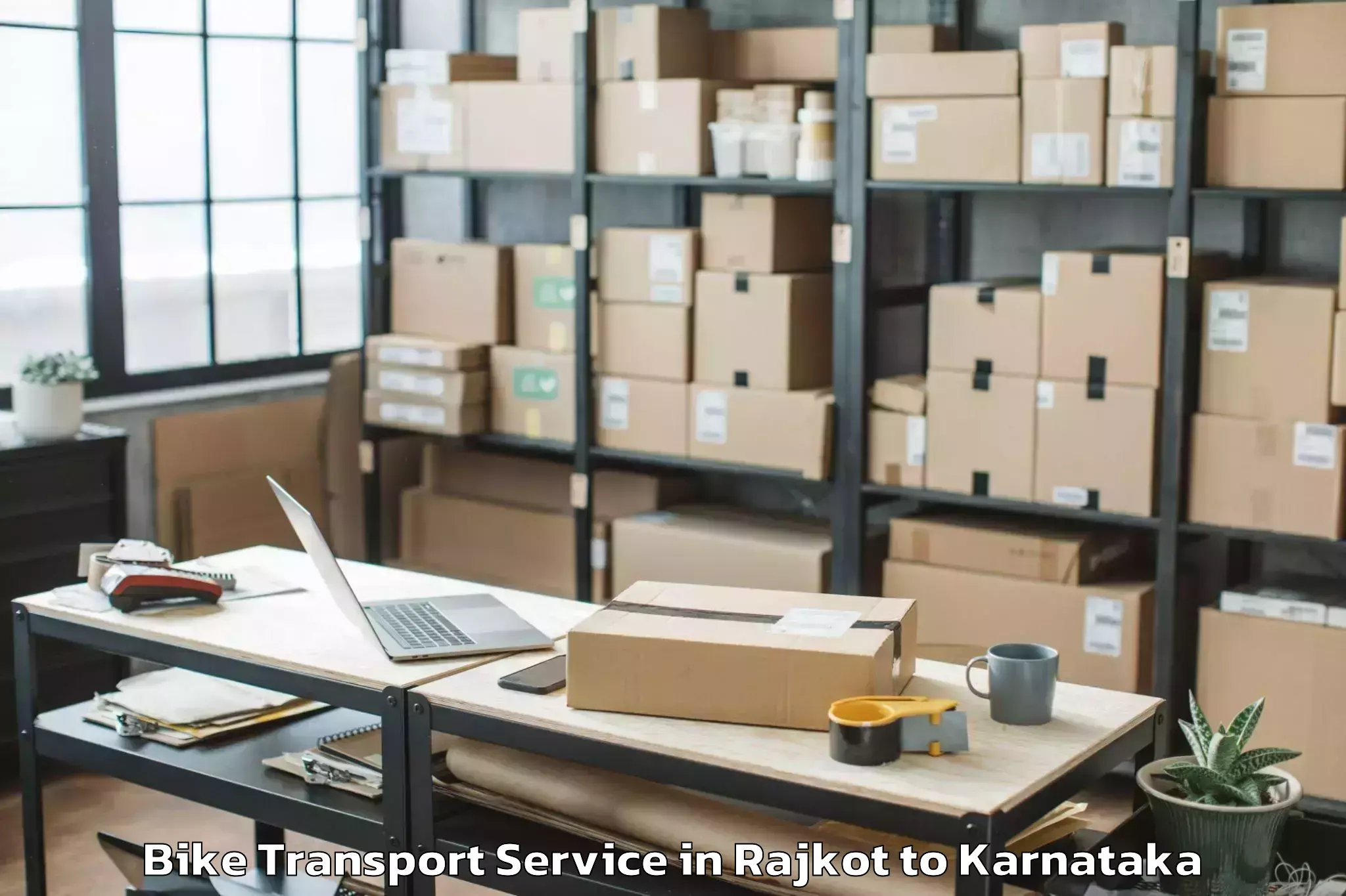 Professional Rajkot to Saraswathipuram Bike Transport